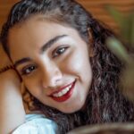 selective focus photography of woman smiling